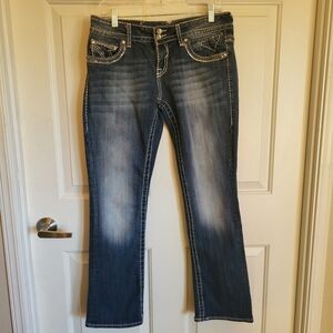 Cute & comfortable Vigoss jeans.  Really pretty back pocket detail.  Size 7/8